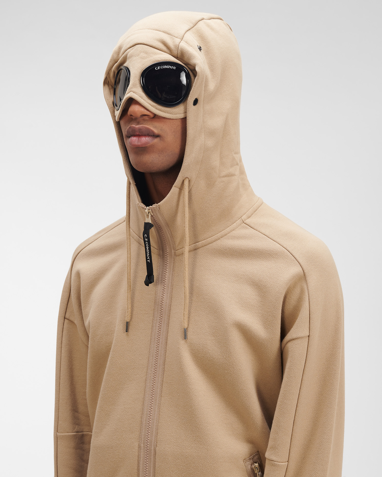 white cp company goggle hoodie